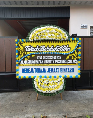 Papan Bunga Duka di Pulau Burung